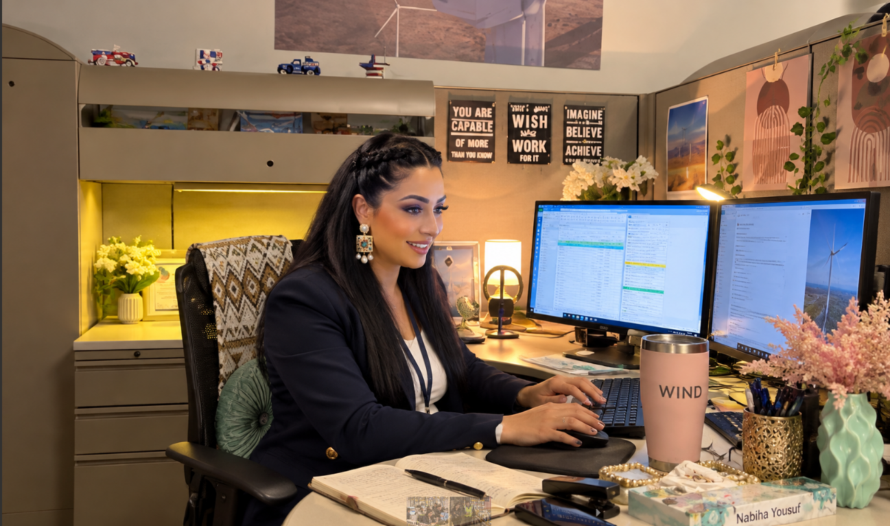 Nabiha Yousuf at her desk, working at her workstation